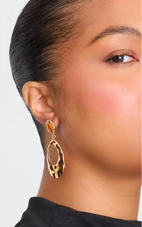 Бурштинові сережки-гвоздики з абстрактним розплавленим коштовним каменем Бурштинові сережки-гвоздики з абстрактним розплавленим коштовним каменем