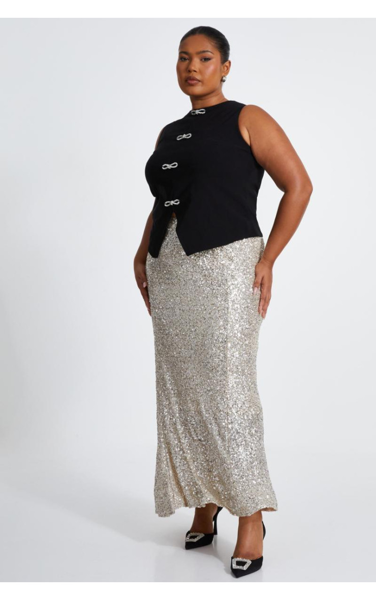 Від білої кривої блискітки максі спідниця