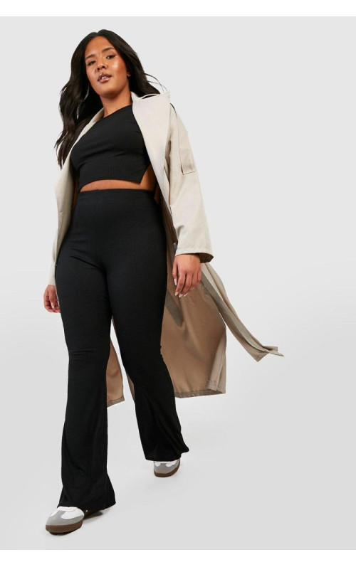 Плюс базові кльошові штани з високою талією в рубчик