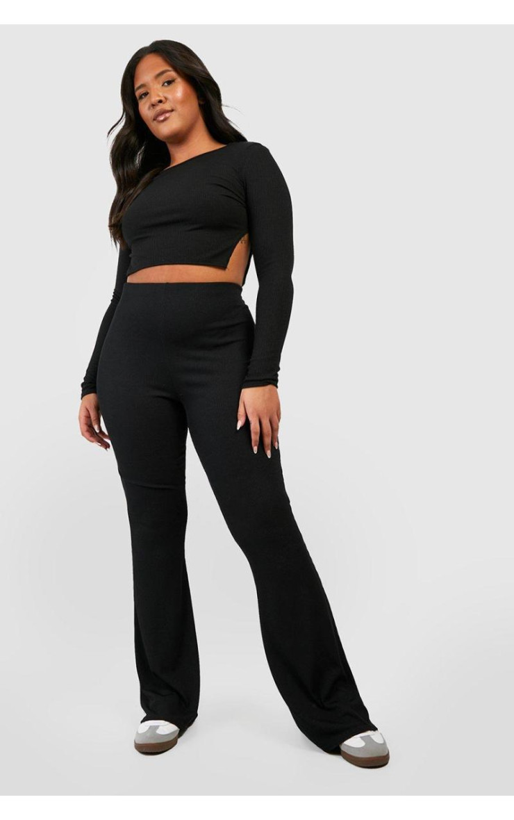 Плюс базові кльошові штани з високою талією в рубчик