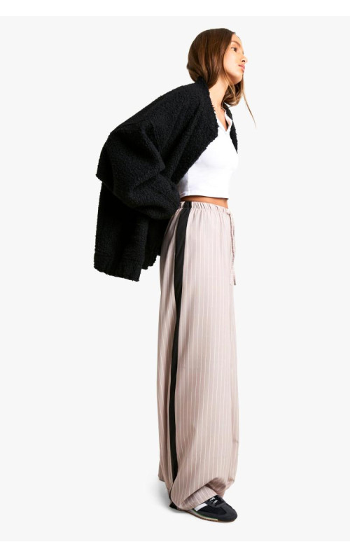 Широкі брюки зі шнурками в тонку смужку збоку