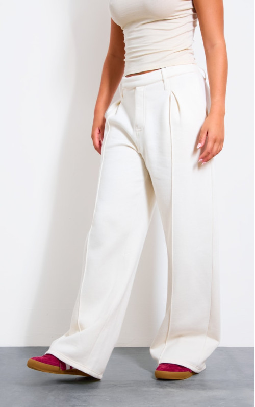 Кремові джоггери з флісбеком і застібками