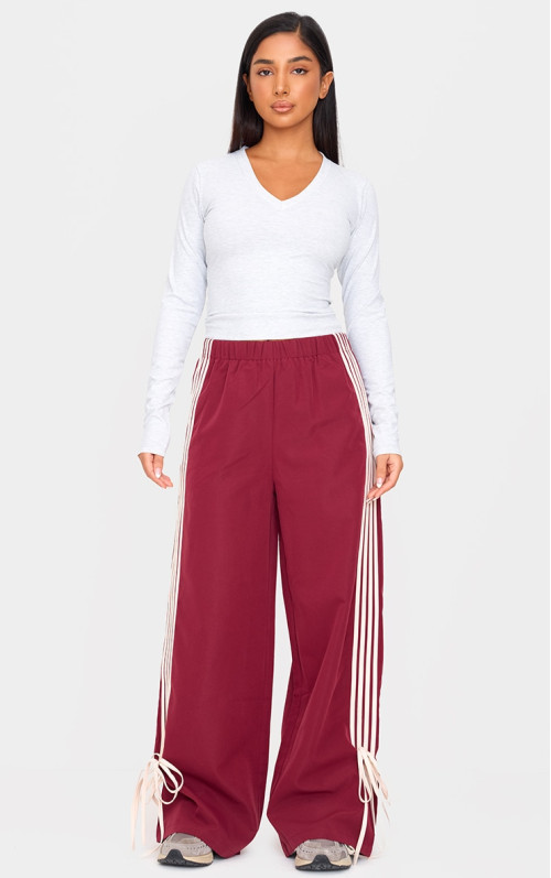 Мініатюрні бордові спортивні штани з бантом із черепашками Мініатюрні бордові спортивні штани з бантом із черепашками