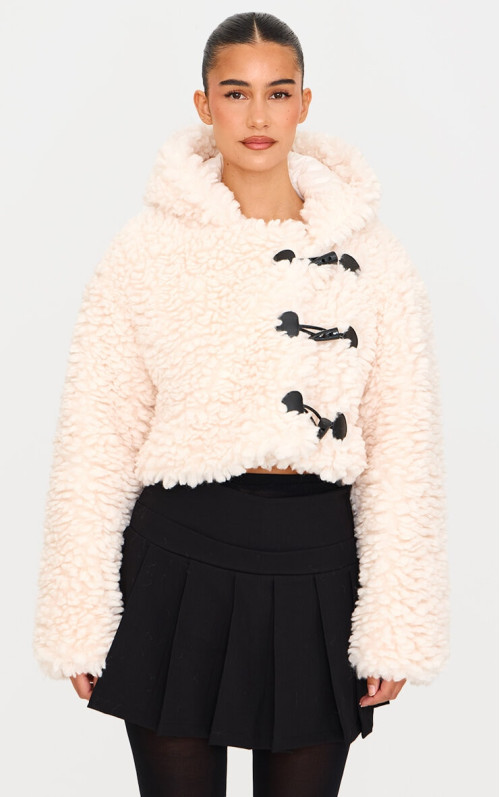 Чорна плетена міні-спідниця із заниженою талією та плісированими деталями