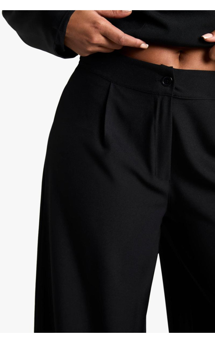 Ткані широкі брюки