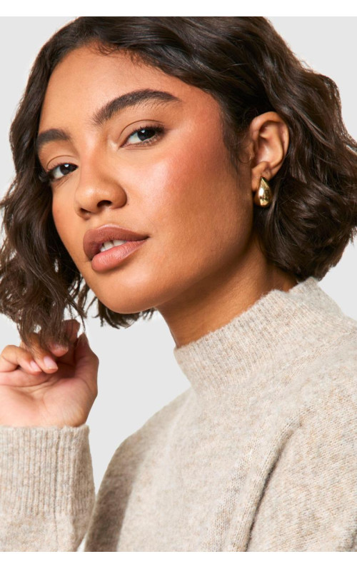 Великі масивні сережки-кільця