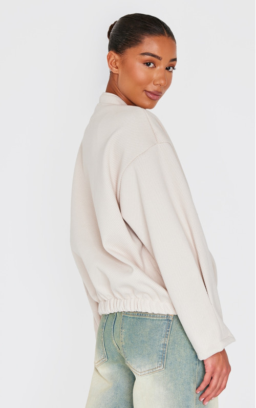 Бежевий оверсайз-бомбер з принтом 