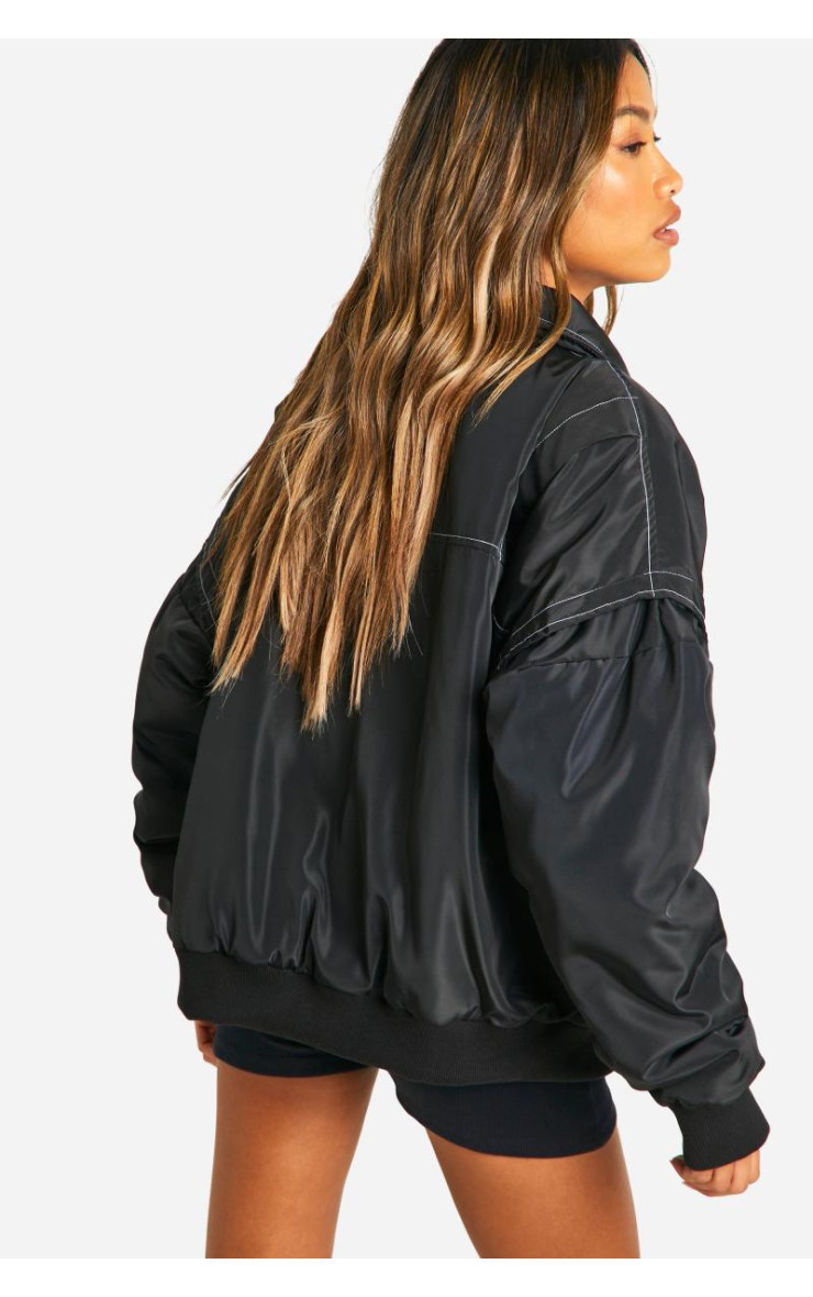 Великий бомбер з контрастними стібками