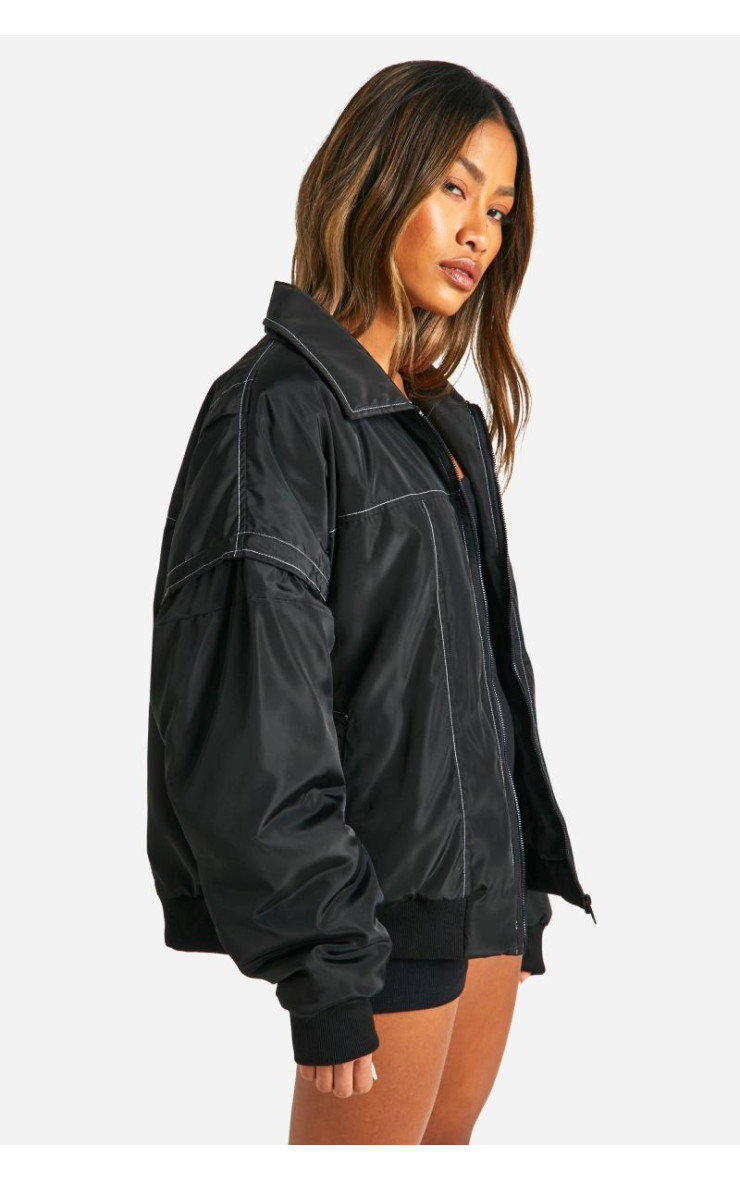 Великий бомбер з контрастними стібками