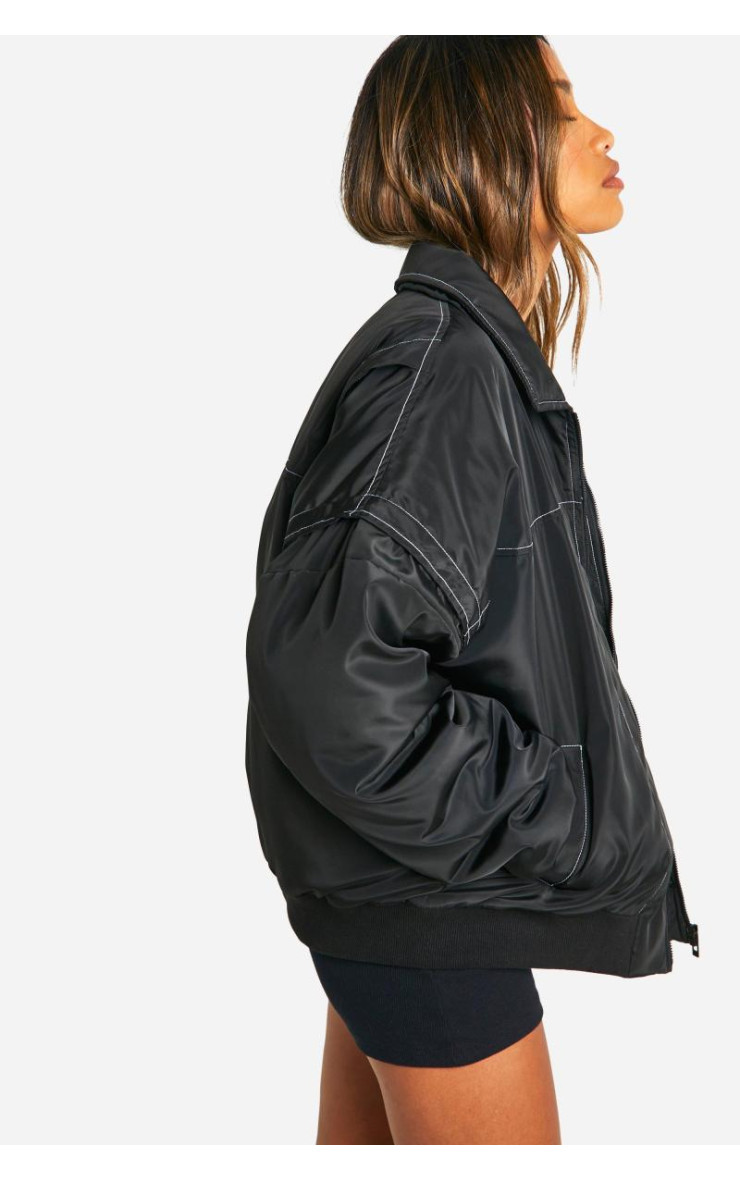 Великий бомбер з контрастними стібками