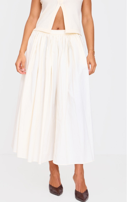 Кремова плетена плаваюча спідниця мідаксі