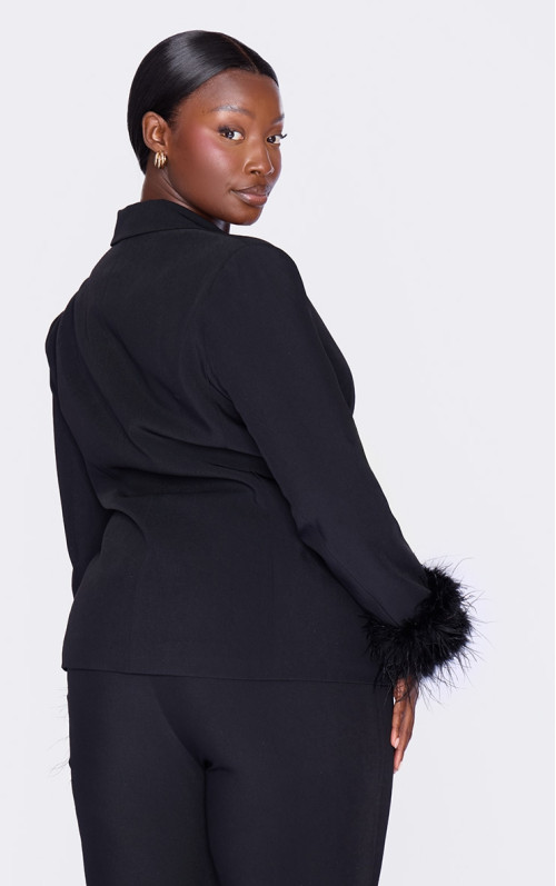 Плюс чорний піджак із оздобленням пір’ям