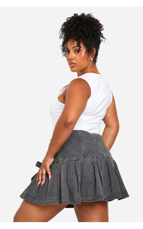 Мікро-міні-спідниця з плісировкою та бантом