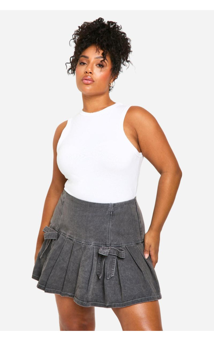 Мікро-міні-спідниця з плісировкою та бантом