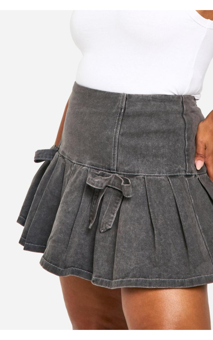 Мікро-міні-спідниця з плісировкою та бантом