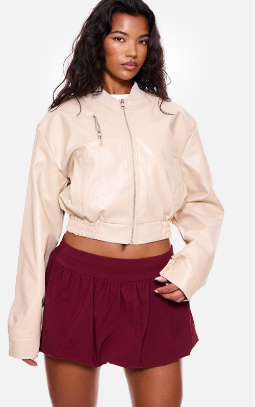 Кремовий бомбер зі штучної шкіри