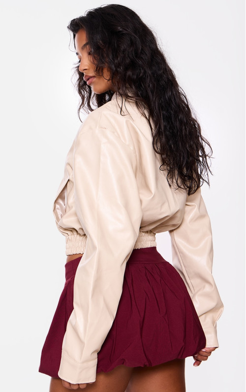 Кремовий бомбер зі штучної шкіри