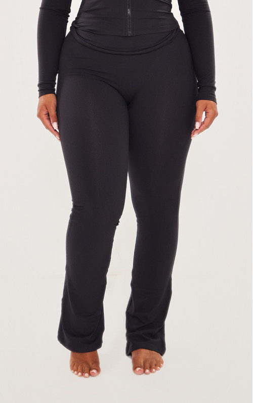 Фігурні чорні штани-кльош із відкидною талією