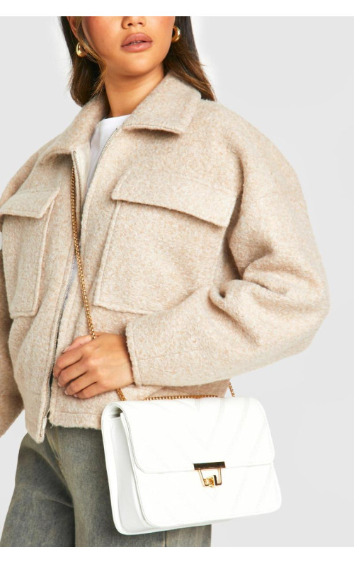 Стьобана сумка на ланцюжку через плече зі штучної шкіри