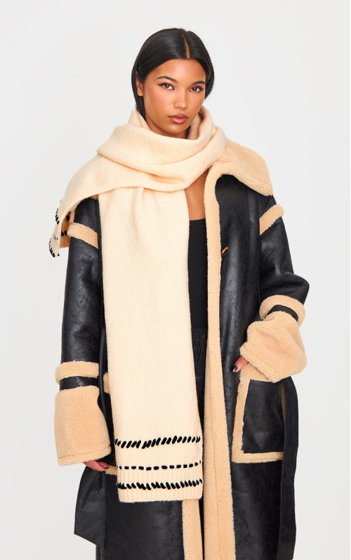 Кремовий в'язаний шарф з контрастним швом