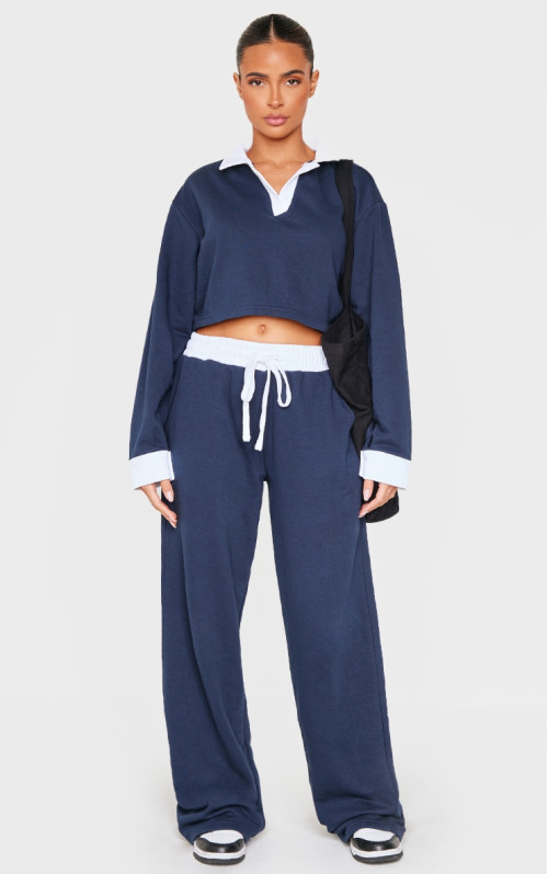 Темно-сині широкі джоггери з контрастною панеллю