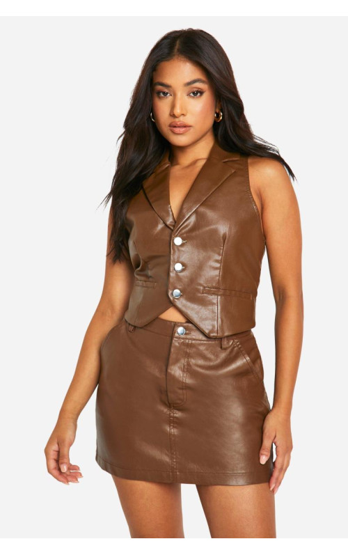 Маленька міні-спідниця зі штучної шкіри