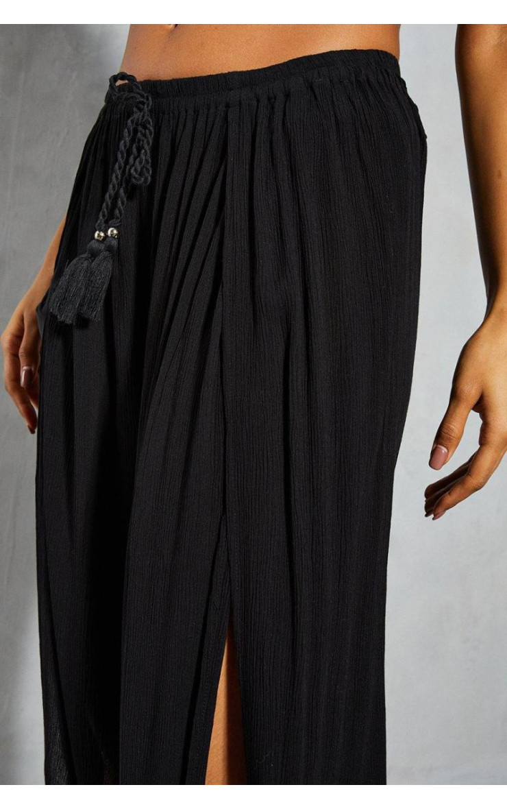 Кинемо широкі штани з розщепленням ніг