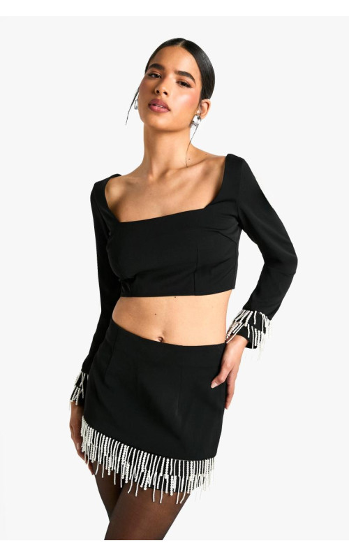 Міні-спідниця з перлинним оздобленням