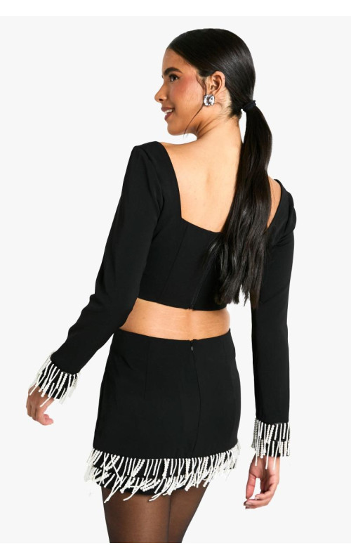 Міні-спідниця з перлинним оздобленням